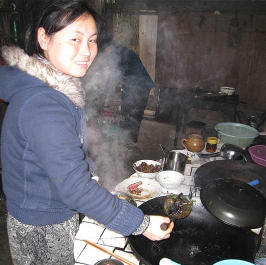 A photo of Sami in her food truck cooking